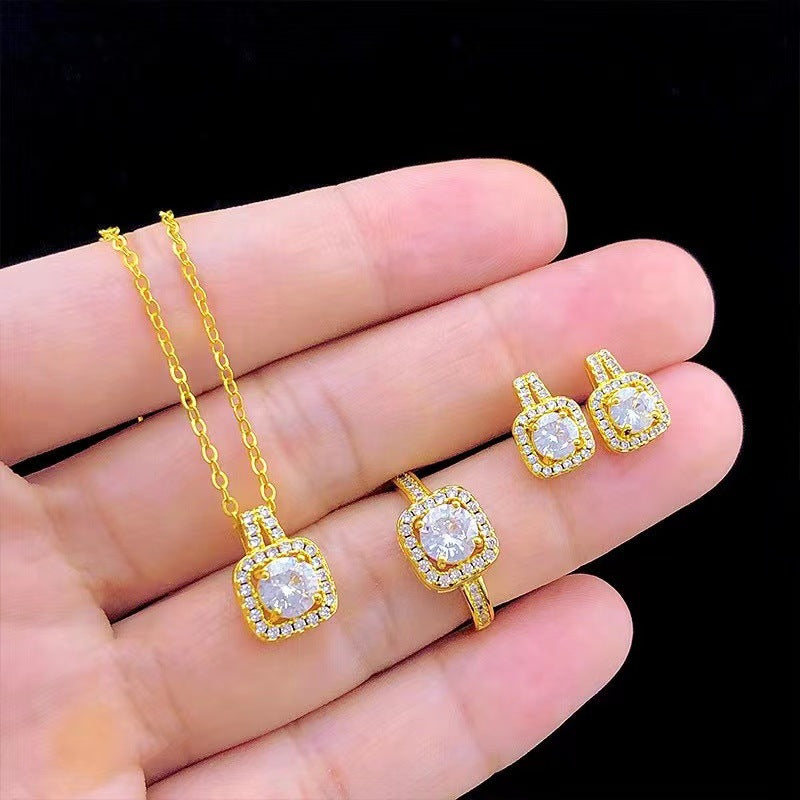 Zircon stud earrings and ring detail
