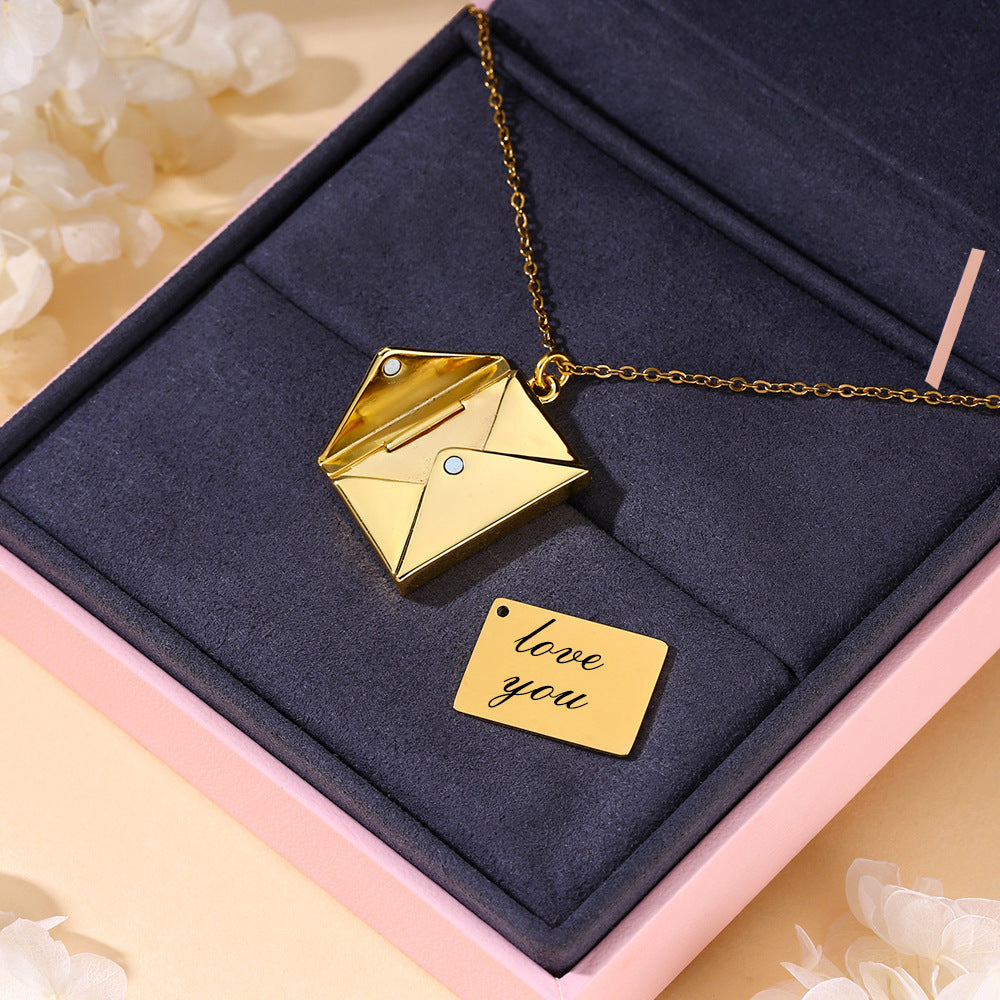 Love letter necklace worn on model