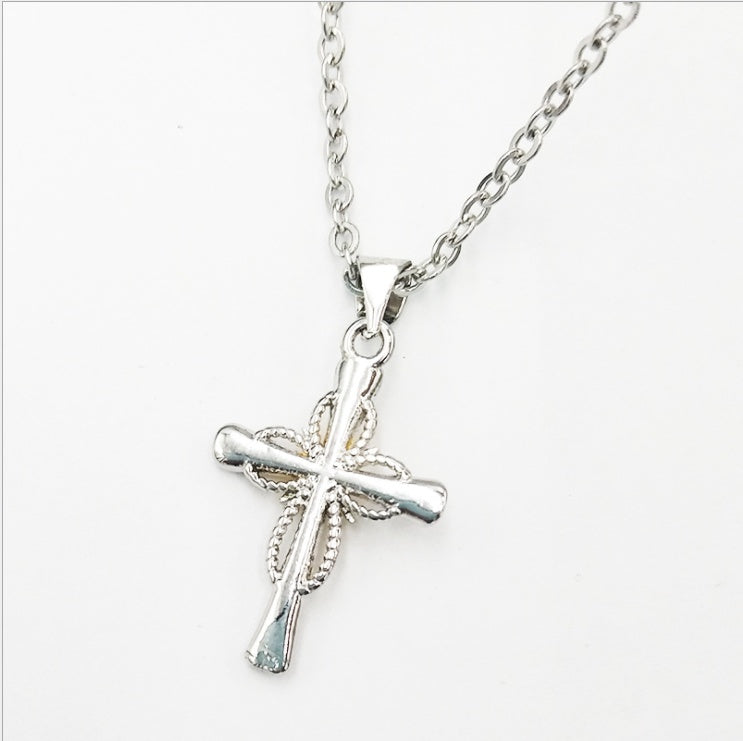 Octagonal star cross necklace close-up detail